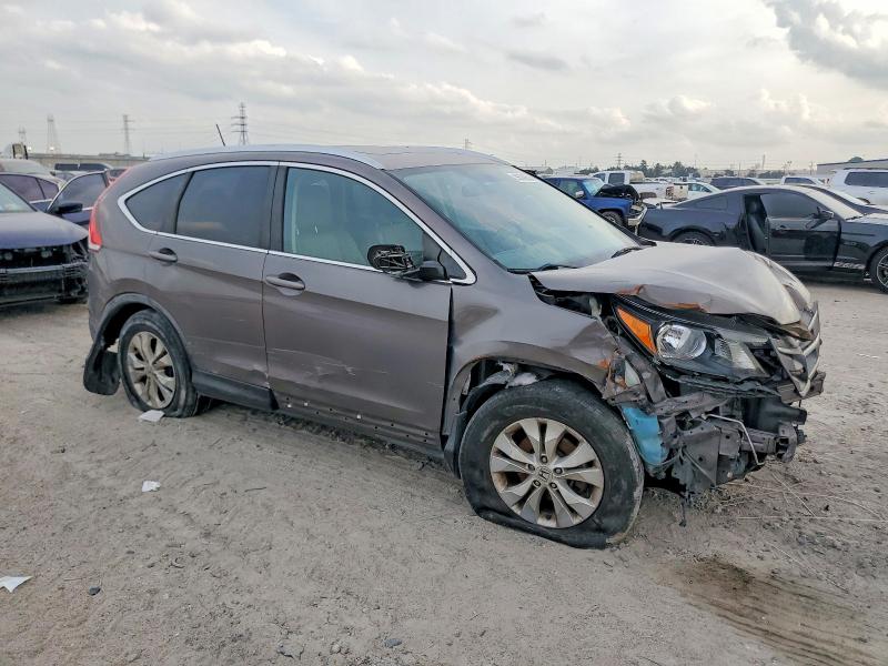 Photo 4 from auction – 2014 HONDA CR-V with VIN 2HKRM3H73EH545263