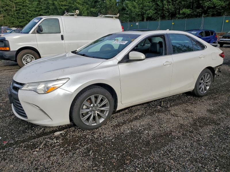 TOYOTA CAMRY LE 2016 with VIN 4T1BF1FKXGU591085 - Photo from auction
