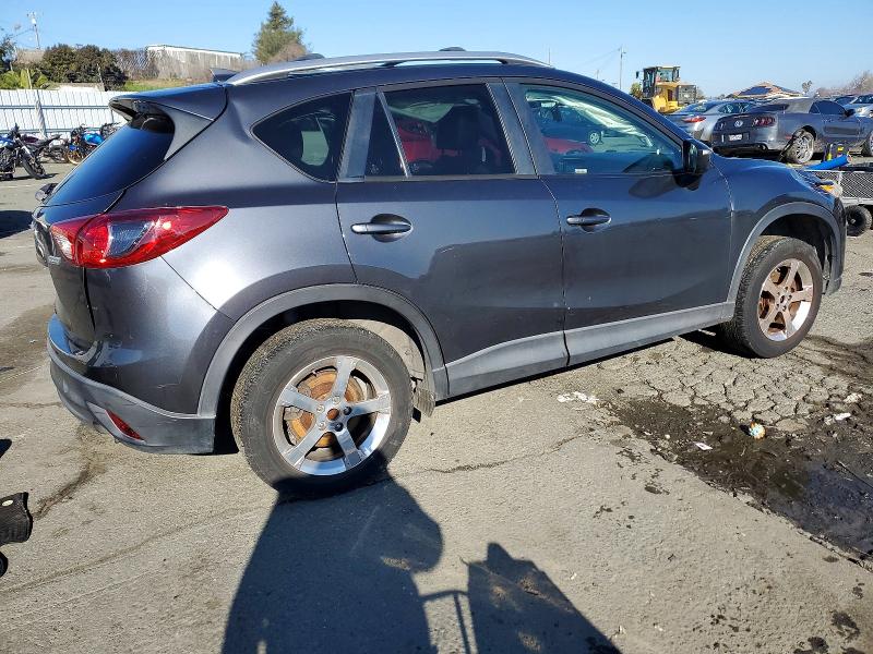 Photo 3 from auction – 2016 MAZDA CX-5 with VIN JM3KE2DY1G0765113