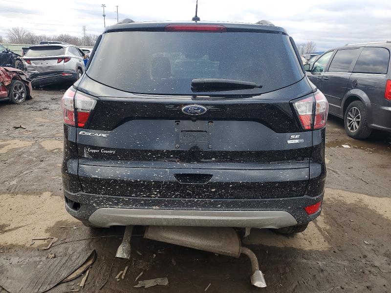 Photo 6 from auction – 2018 FORD ESCAPE with VIN 1FMCU9GD6JUB38016