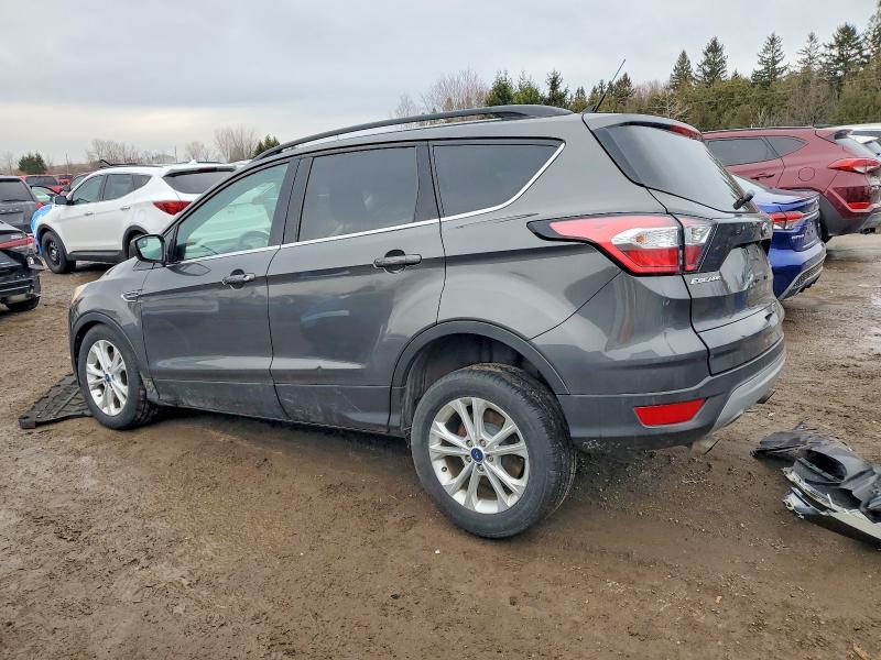 Photo 2 from auction – 2018 FORD ESCAPE with VIN 1FMCU9GDXJUC14577