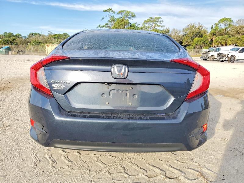 Photo 6 from auction – 2017 HONDA CIVIC LX with VIN 2HGFC2F51HH568475