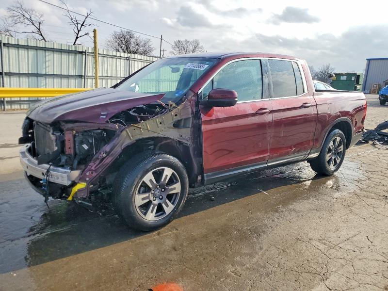HONDA RIDGELINE 2017 with VIN 5FPYK2F59HB011594 - Photo from auction
