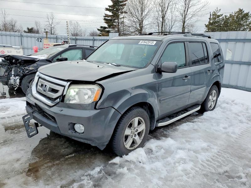 HONDA PILOT EXL 2011 with VIN 5FNYF4H57BB503098 - Photo from auction