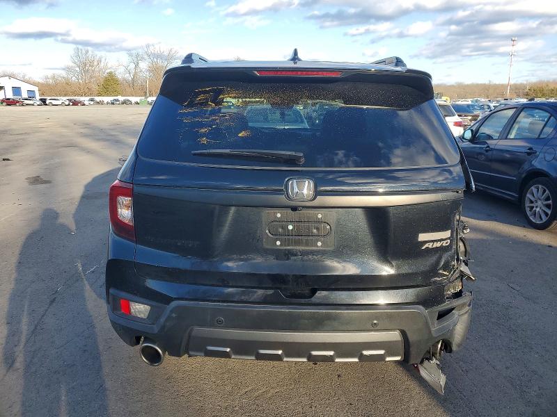 Photo 6 from auction – 2022 HONDA PASSPORT T with VIN 5FNYF8H60NB030956