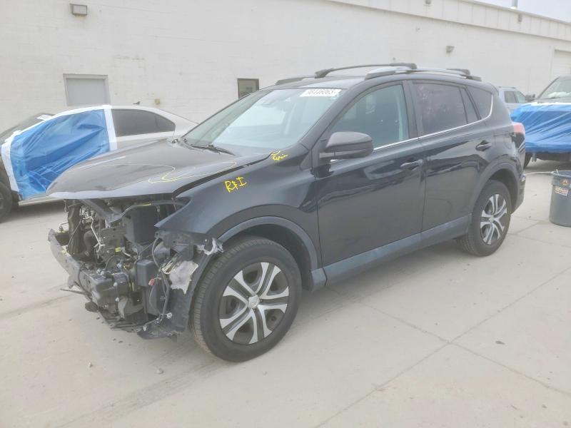 TOYOTA RAV4 LE 2018 with VIN 2T3BFREV4JW771736 - Photo from auction