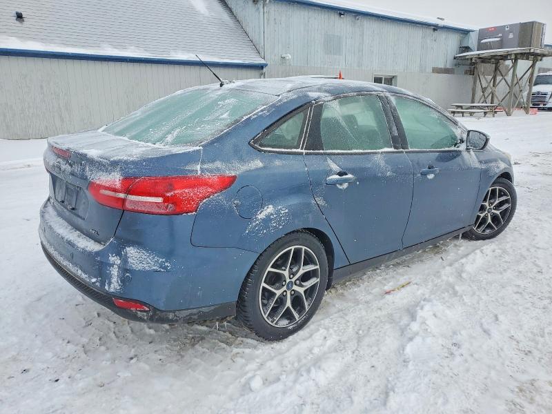 Photo 3 from auction – 2018 FORD FOCUS SEL with VIN 1FADP3H24JL264963