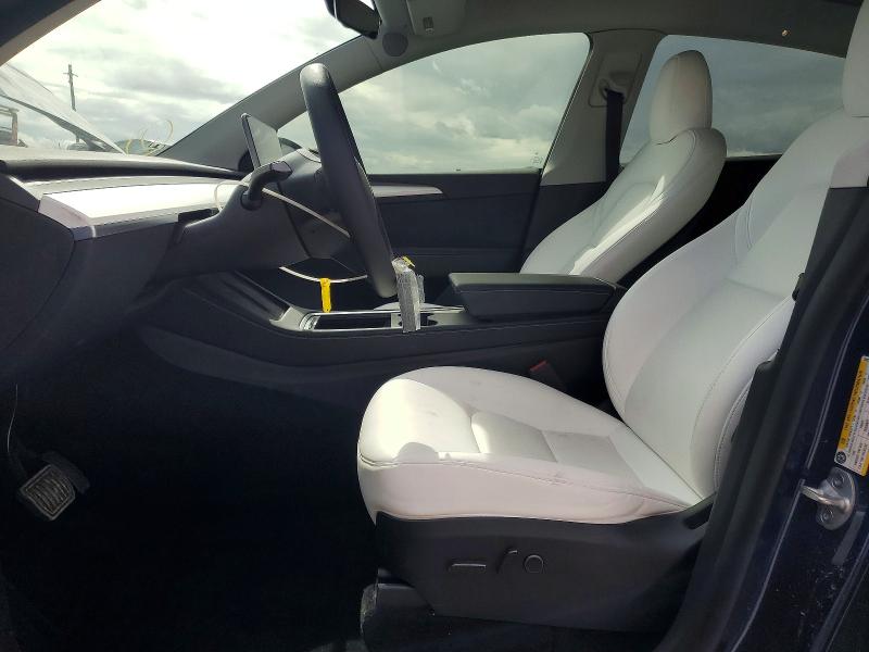 Photo 7 from auction – 2023 TESLA MODEL Y with VIN 7SAYGDEE6PA058975