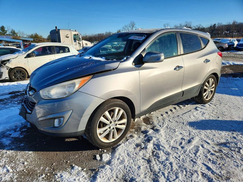 HYUNDAI TUCSON GLS 2011 with VIN KM8JUCAC0BU203870 - Photo from auction