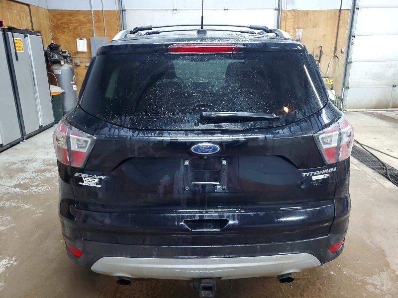 Photo 6 from auction – 2017 FORD ESCAPE with VIN 1FMCU9J98HUA26493