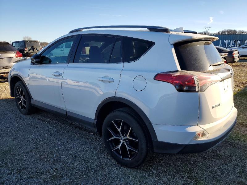 Photo 2 from auction – 2018 TOYOTA RAV4 with VIN 2T3NFREV7JW449072