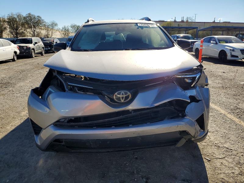 Photo 5 from auction – 2018 TOYOTA RAV4 LE with VIN JTMZFREV7JD131614