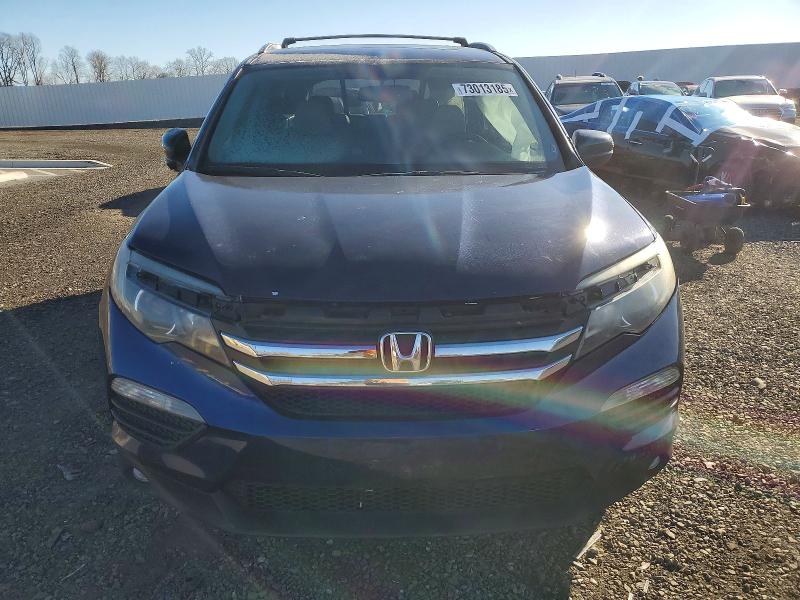 Photo 5 from auction – 2016 HONDA PILOT EXL with VIN 5FNYF6H59GB041095