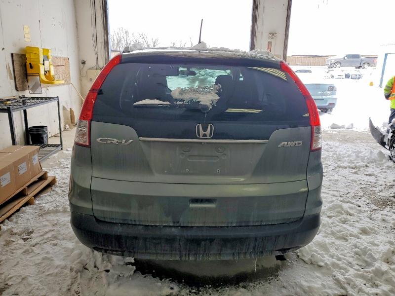 Photo 6 from auction – 2012 HONDA CR-V EXL with VIN 5J6RM4H76CL063850