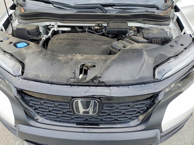 Photo 12 from auction – 2021 HONDA PASSPORT E with VIN 5FNYF7H57MB003009