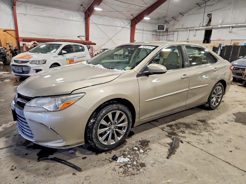 TOYOTA CAMRY LE 2017 with VIN 4T1BF1FK3HU690168 - Photo from auction