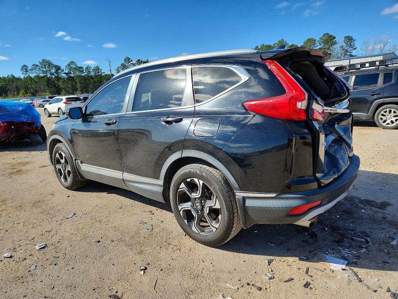 Photo 2 from auction – 2018 HONDA CR-V with VIN 7FARW1H96JE036023