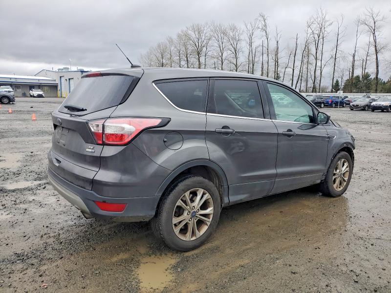 Photo 3 from auction – 2017 FORD ESCAPE SE with VIN 1FMCU9GD5HUC24038