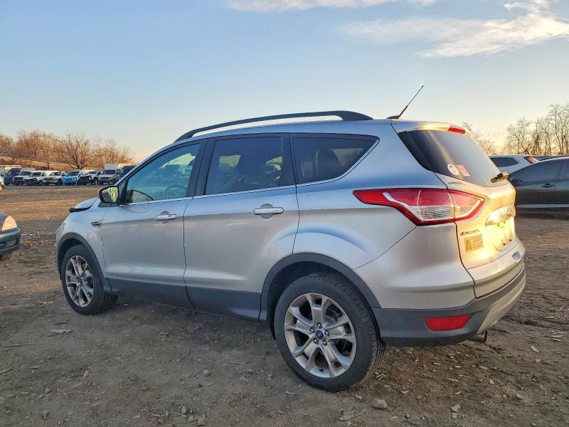 Photo 2 from auction – 2013 FORD ESCAPE with VIN 1FMCU9HX5DUC07095