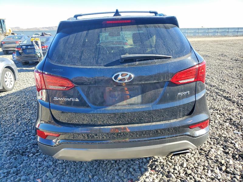 Photo 6 from auction – 2017 HYUNDAI SANTA FE S with VIN 5NMZU3LB7HH018792