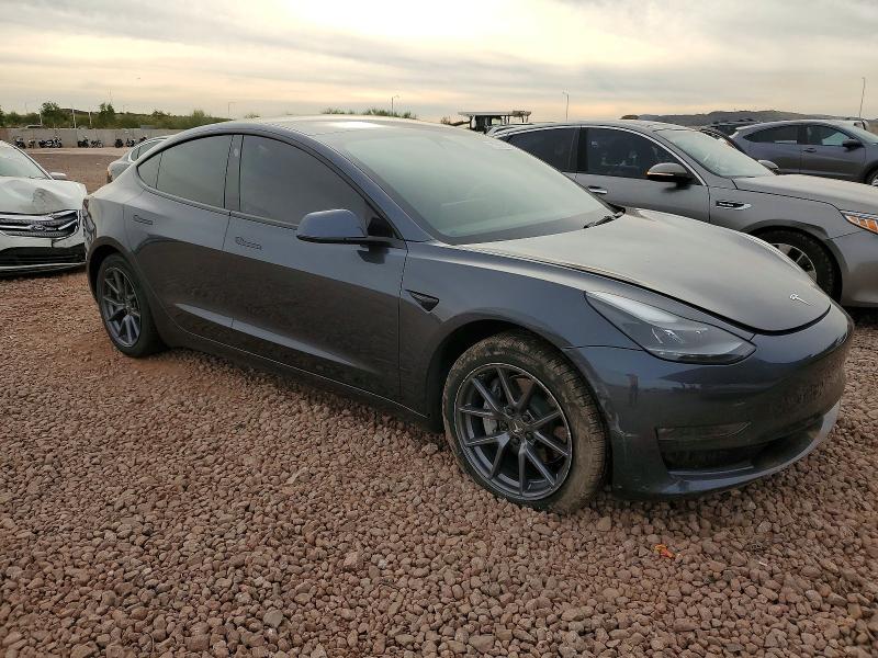 Photo 4 from auction – 2022 TESLA MODEL 3 with VIN 5YJ3E1EB7NF206505