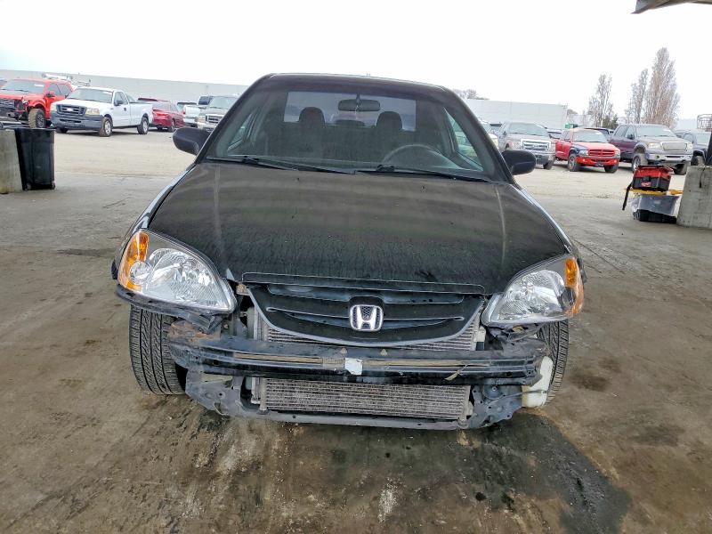 Photo 5 from auction – 2003 HONDA CIVIC LX with VIN 1HGEM22503L009526