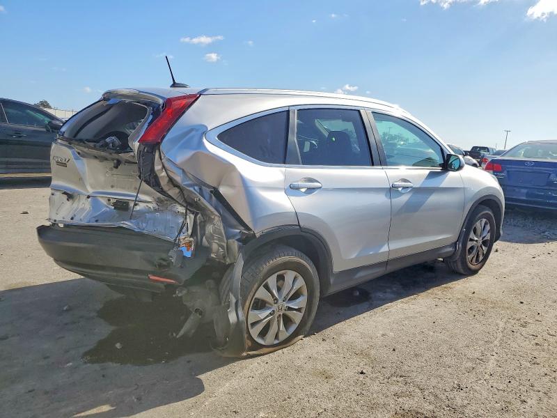Photo 3 from auction – 2014 HONDA CR-V with VIN 2HKRM3H72EH557873