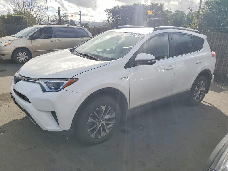 Photo 1 from auction – 2018 TOYOTA RAV4 HV LE with VIN JTMRJREV4JD228106