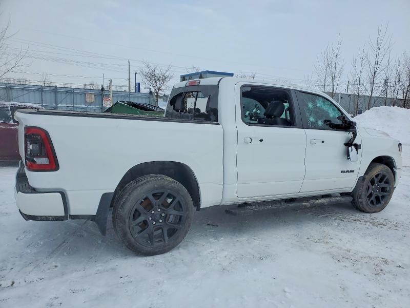 Photo 3 from auction – 2023 RAM 1500 with VIN 1C6SRFVTXPN690641