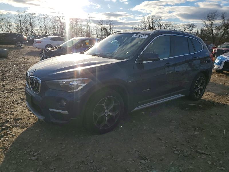 BMW X1 XDRIVE2 2017 with VIN WBXHT3C36H5F76830 - Photo from auction