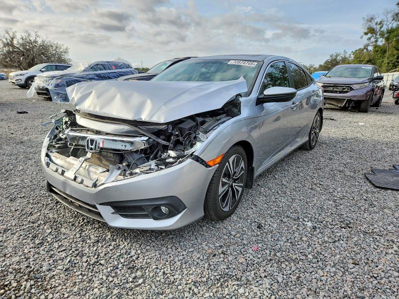 HONDA CIVIC EX 2017 with VIN 19XFC1F36HE001519 - Photo from auction