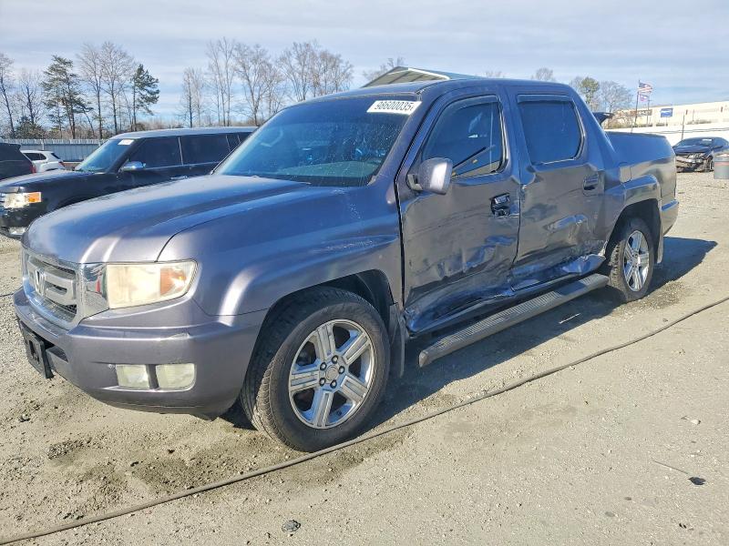 HONDA RIDGELINE 2010 with VIN 5FPYK1F54AB012801 - Photo from auction