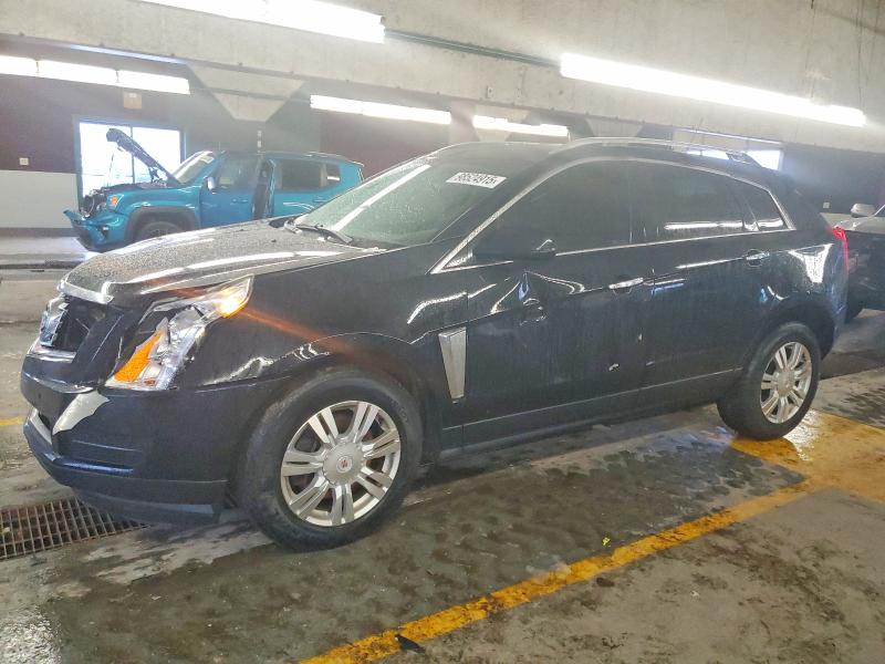 CADILLAC SRX 2015 с VIN 3GYFNEE34FS638453 - Снимка от търг