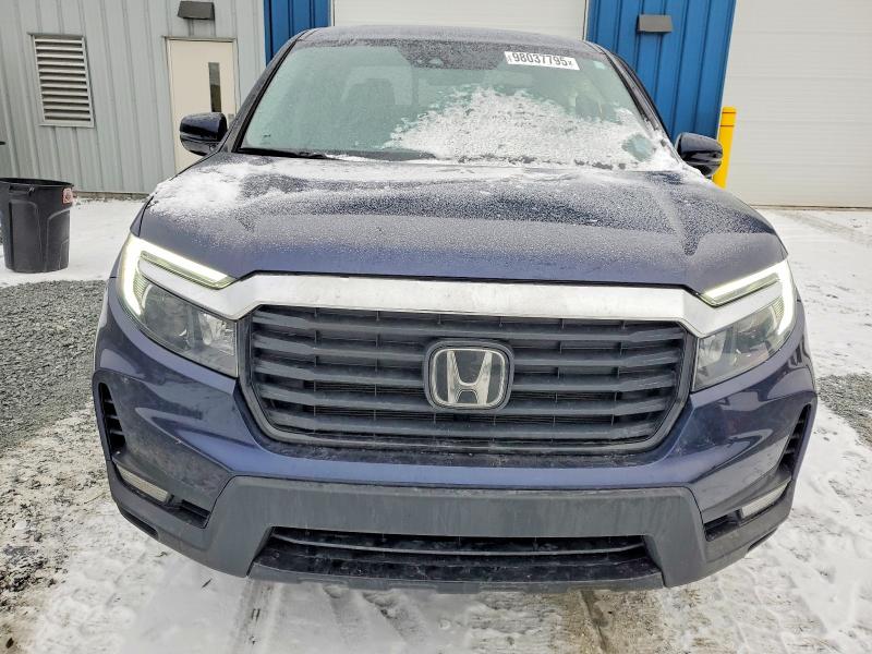Photo 5 from auction – 2021 HONDA RIDGELINE with VIN 5FPYK3F76MB500620