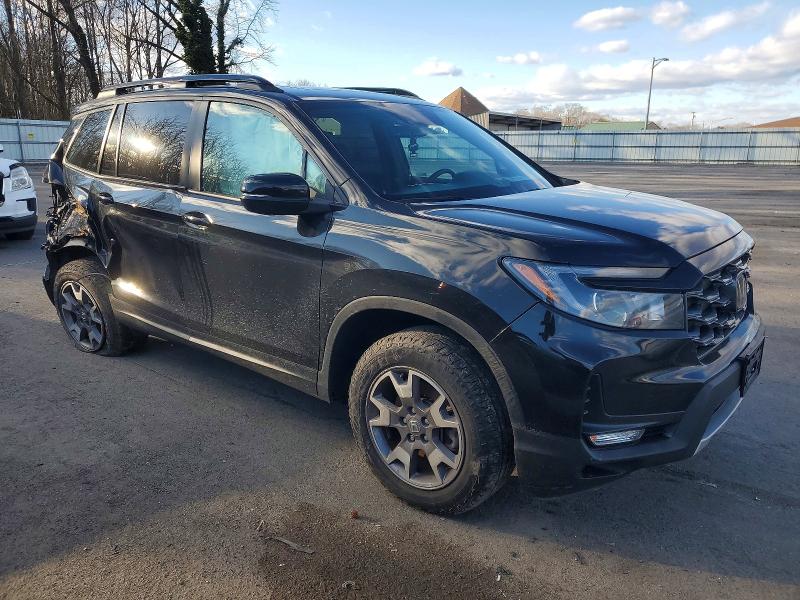 Photo 4 from auction – 2022 HONDA PASSPORT T with VIN 5FNYF8H60NB030956