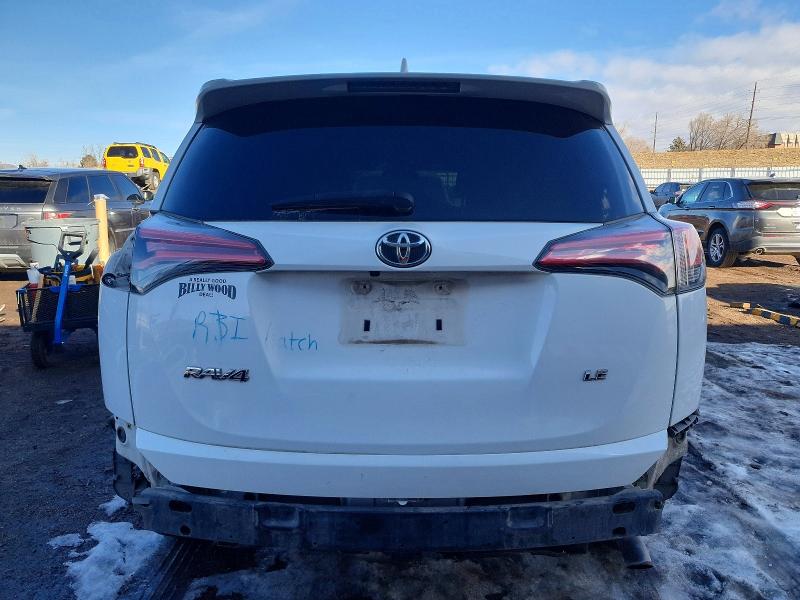 Photo 6 from auction – 2018 TOYOTA RAV4 LE with VIN 2T3ZFREV5JW446527
