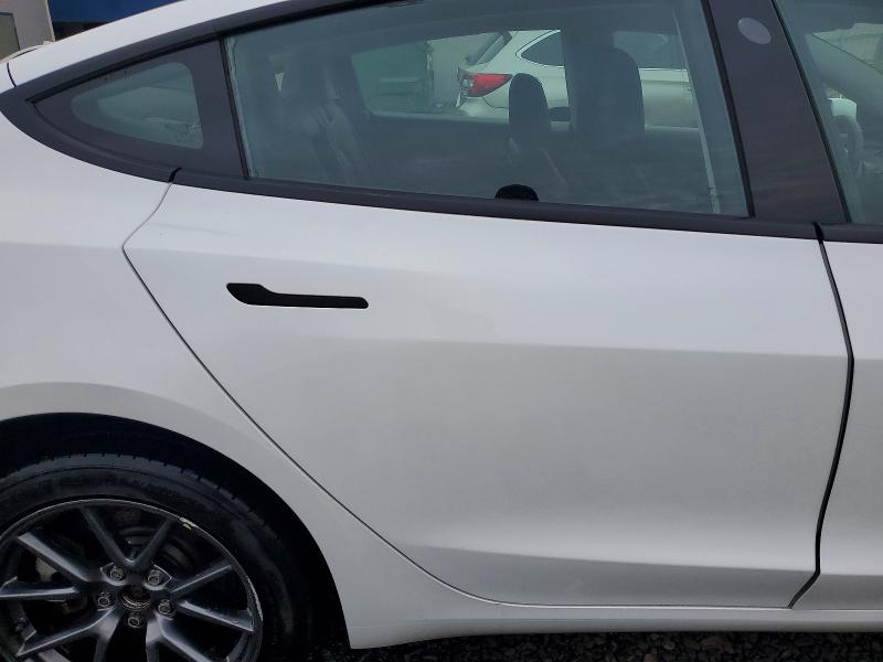 Photo 10 from auction – 2022 TESLA MODEL 3 with VIN 5YJ3E1EB4NF119466