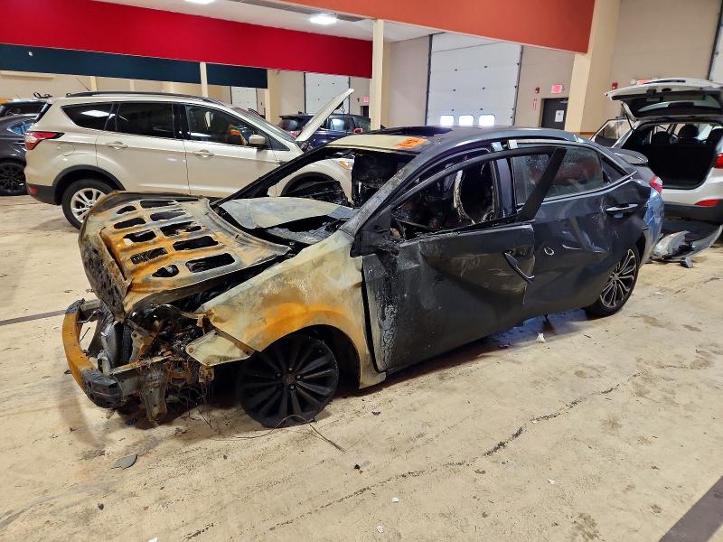 TOYOTA COROLLA L 2015 with VIN 2T1BURHE0FC232694 - Photo from auction
