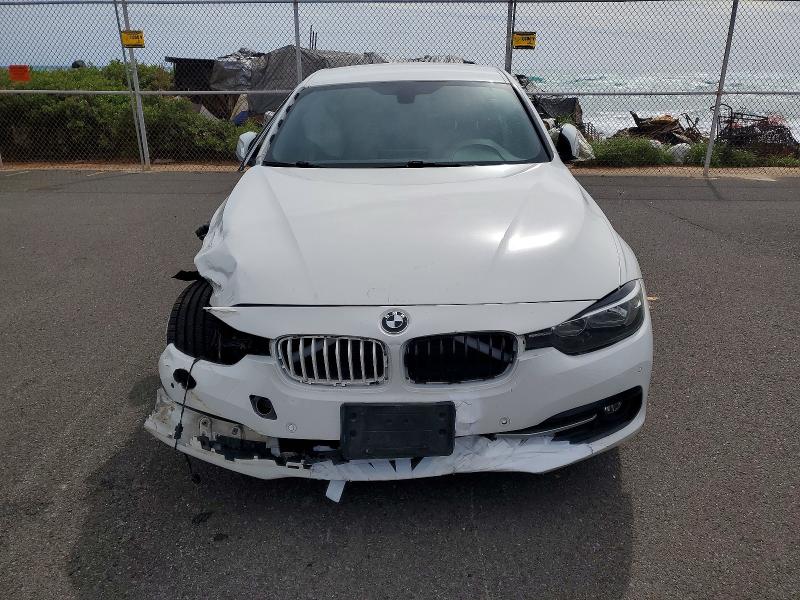 Photo 5 from auction – 2017 BMW 330 with VIN WBA8B9G30HNU55525