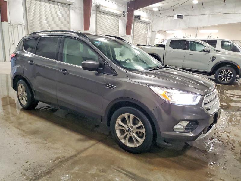 Photo 4 from auction – 2017 FORD ESCAPE SE with VIN 1FMCU9GD0HUC74314