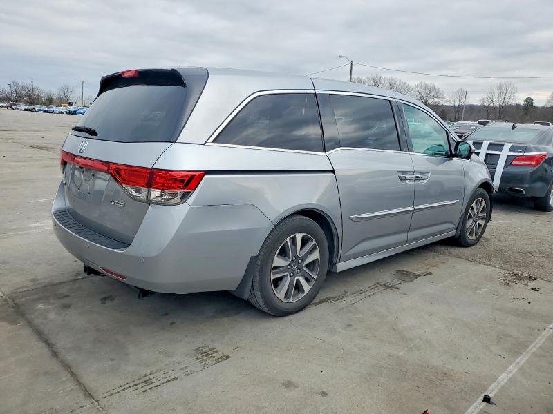 Photo 3 from auction – 2016 HONDA ODYSSEY with VIN 5FNRL5H91GB009154