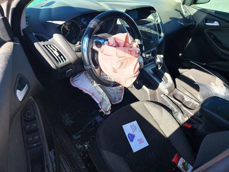 Photo 8 from auction – 2014 FORD FOCUS SE with VIN 1FADP3F22EL208321