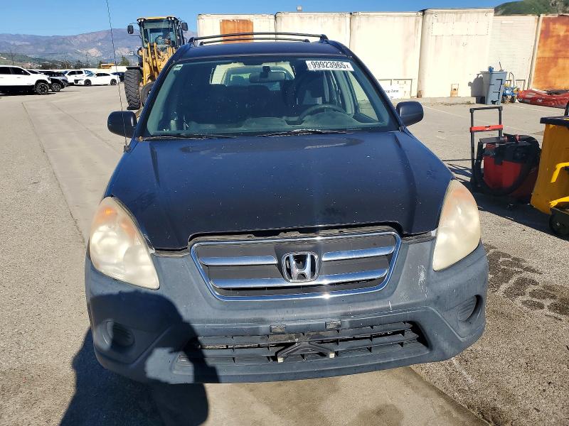 Photo 5 from auction – 2005 HONDA CR-V LX with VIN JHLRD68585C019273