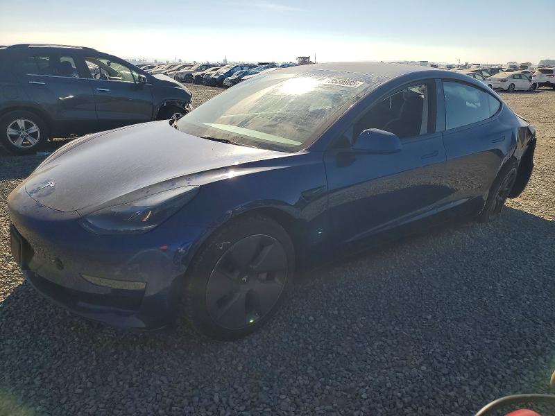 TESLA MODEL 3 2022 with VIN 5YJ3E1EA8NF128999 - Photo from auction