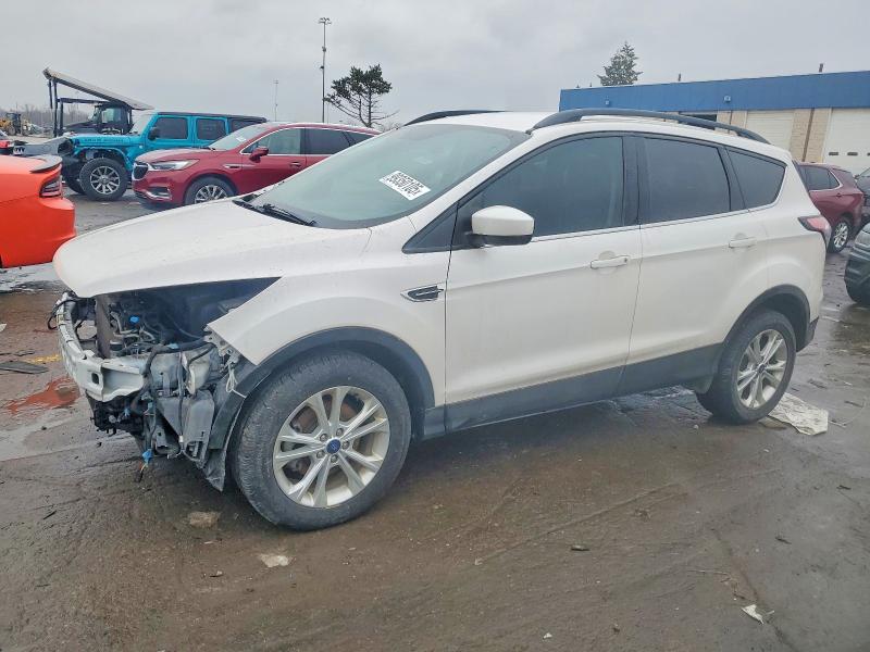 FORD ESCAPE SE 2018 with VIN 1FMCU0GD7JUD22148 - Photo from auction