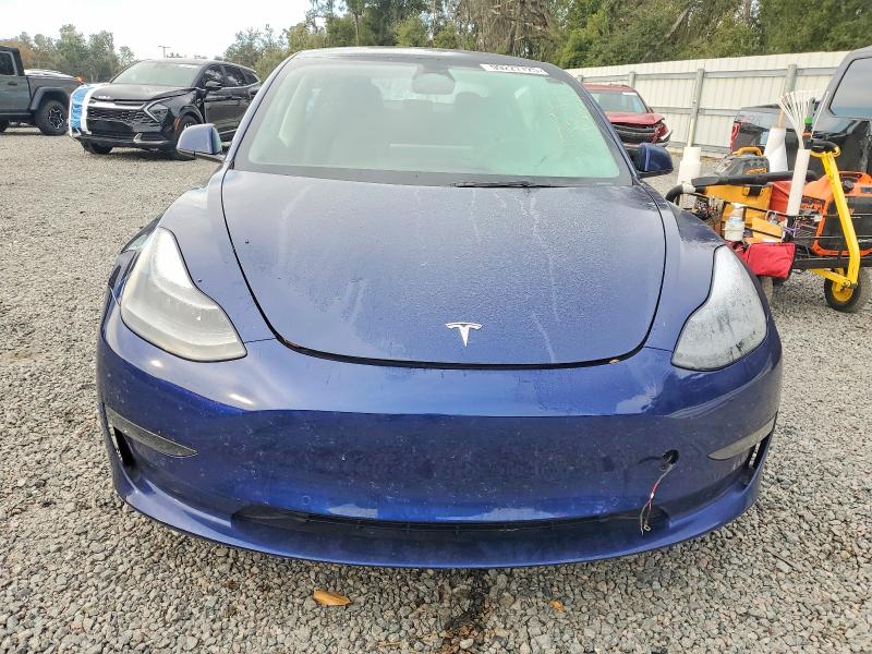 Photo 5 from auction – 2022 TESLA MODEL 3 with VIN 5YJ3E1EB0NF336643