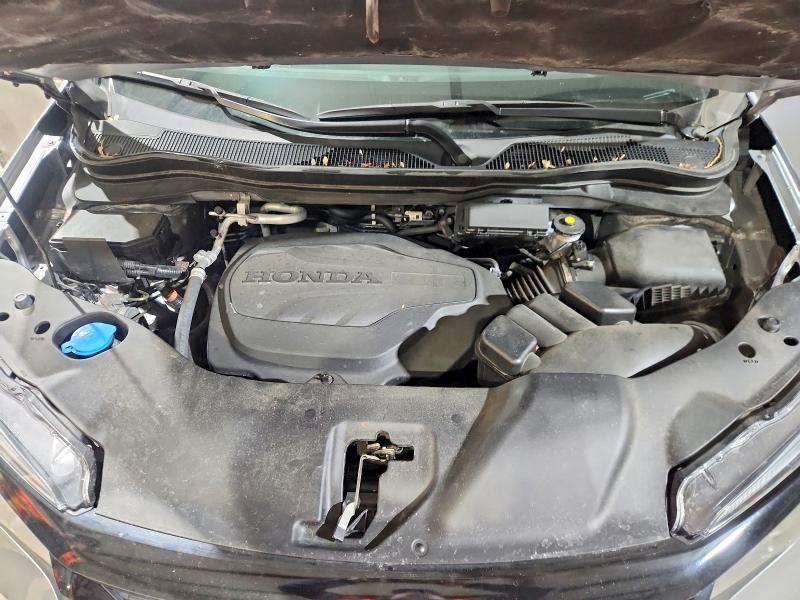 Photo 12 from auction – 2021 HONDA PASSPORT E with VIN 5FNYF8H51MB035704