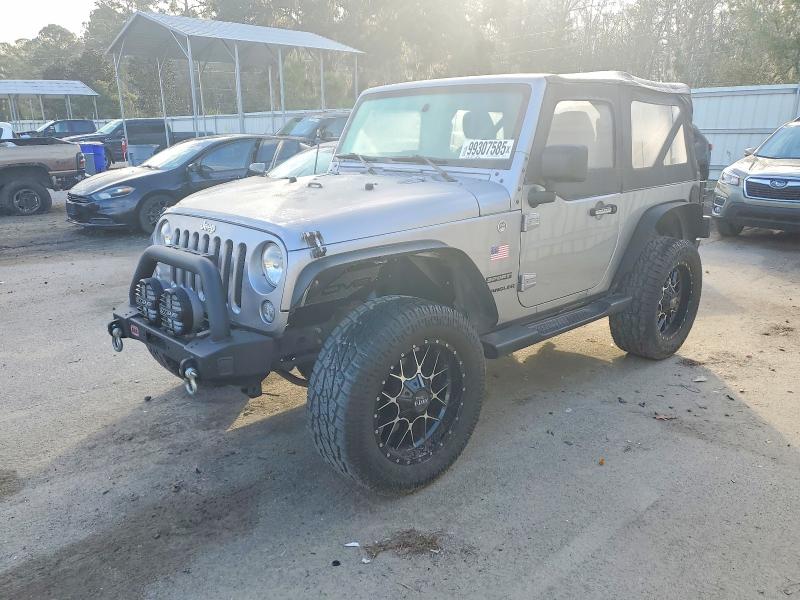 JEEP WRANGLER S 2015 with VIN 1C4AJWAG6FL542162 - Photo from auction