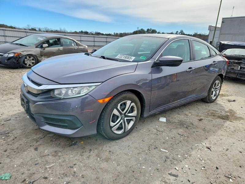 HONDA CIVIC LX 2016 with VIN 2HGFC2F58GH555446 - Photo from auction