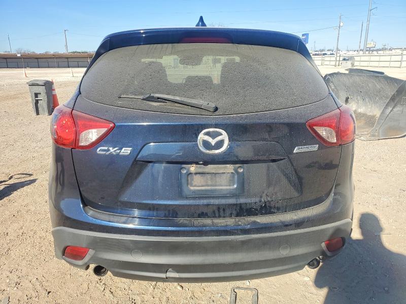 Photo 6 from auction – 2014 MAZDA CX-5 TOURI with VIN JM3KE2CY2E0415374